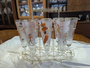 8 Orange and Gold Libbey Calypso Pilsner Glasses with a Wire Rack